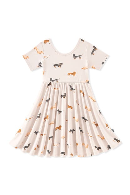 Beige Twirl Dress in Dachshund print on a white background