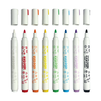 Row of uncapped markers from OOLY Vivid Pop! Water Based Paint Markers - Set of 8