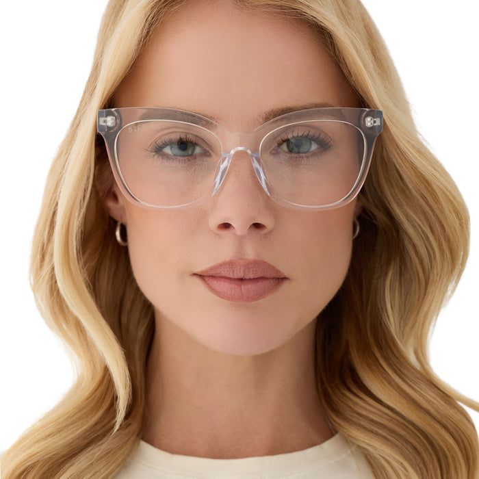 on model - blonde female wearing diff eyewear featuring the winston cat eye prescription glasses with a clear crystal frame front view
