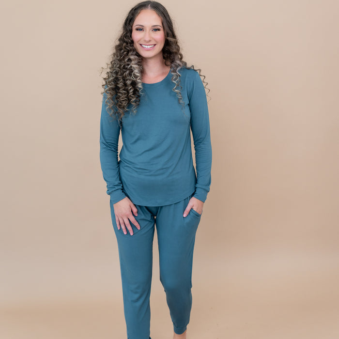 Female modeling the Women's Jogger Pajama Set in Atlantic with one hand in pants pocket