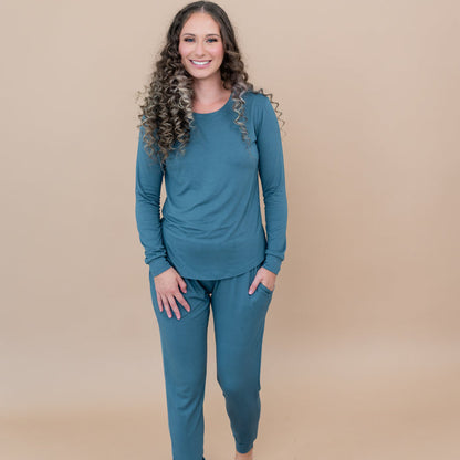 Female modeling the Women's Jogger Pajama Set in Atlantic with one hand in pants pocket