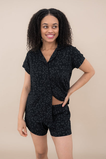 Woman modeling Women’s Short Sleeve Pajama Set in Midnight Leopard