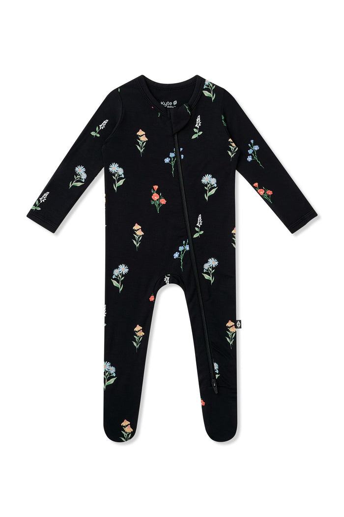 Black Zippered Footie in Wildflower print on a white background