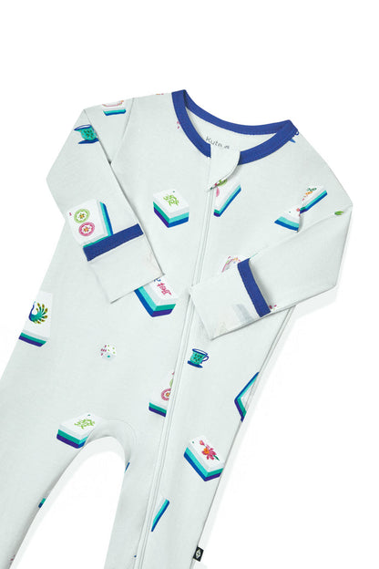 Blue Zippered Romper with zipper garage in Mahjong pattern on a white background
