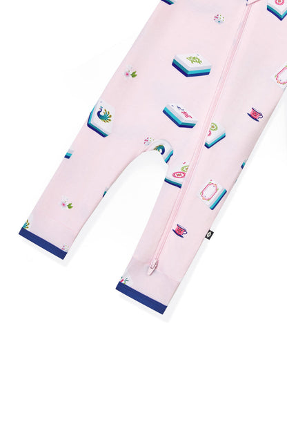 Bottom part of Pink Zippered Romper with Mahjong pattern on a white background